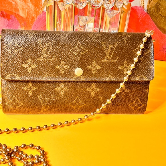Louis Vuitton Handbags - Louis Vuitton Sarah wallet dark Monogram used in decent condition.